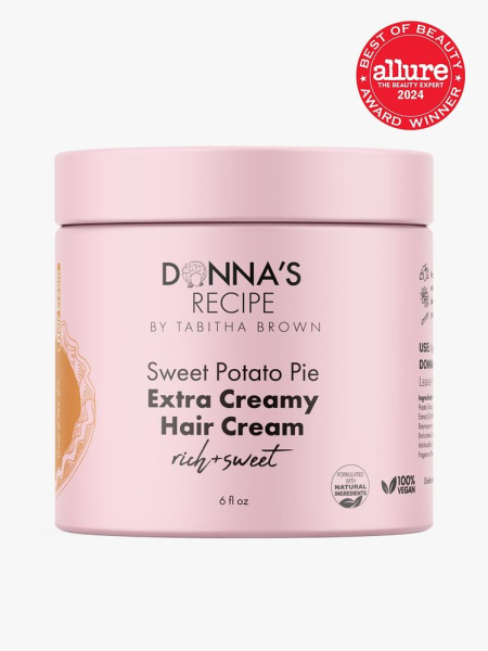 hair cream in branded pink jar with lid on light gray background with red and white 2024 allure best of beauty seal